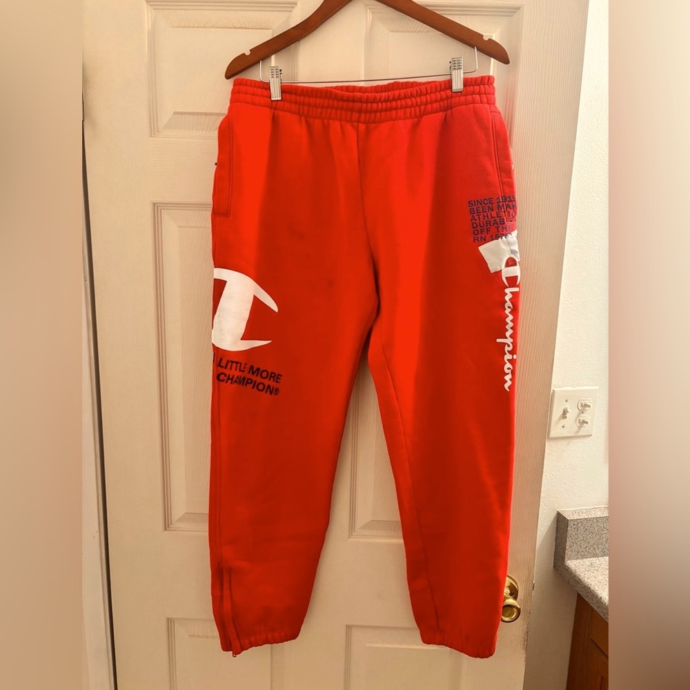 Champion: Red Sweatpants with Logo